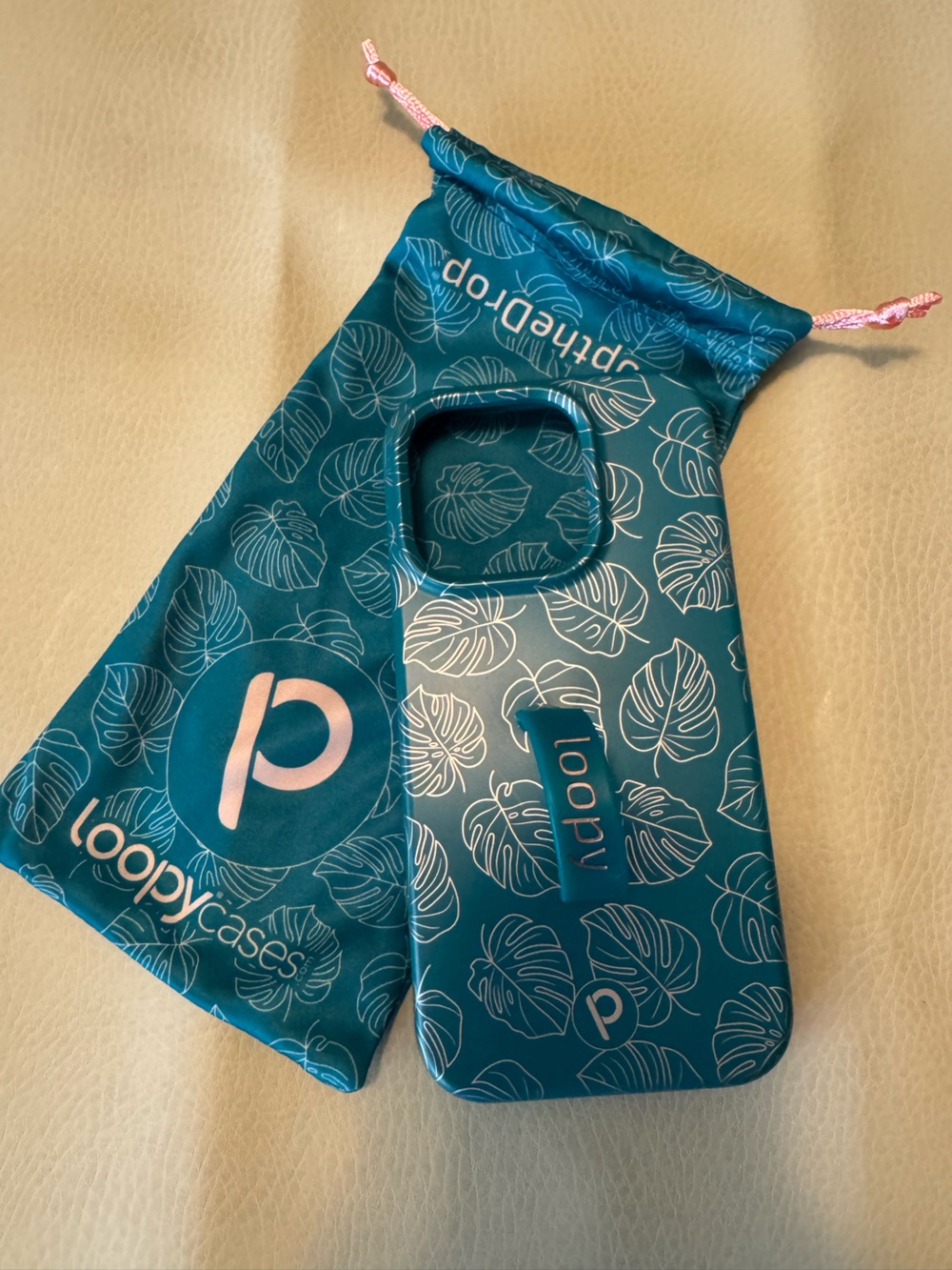 Loopy Teal Phone Grip Sleeve with Leaf Print - iPhone 15 Pro!